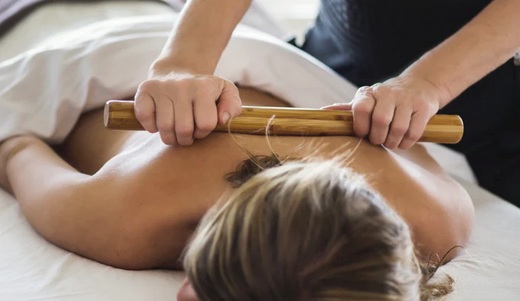 Heated bamboo massage therapy treatment in Kingsville Ontario
