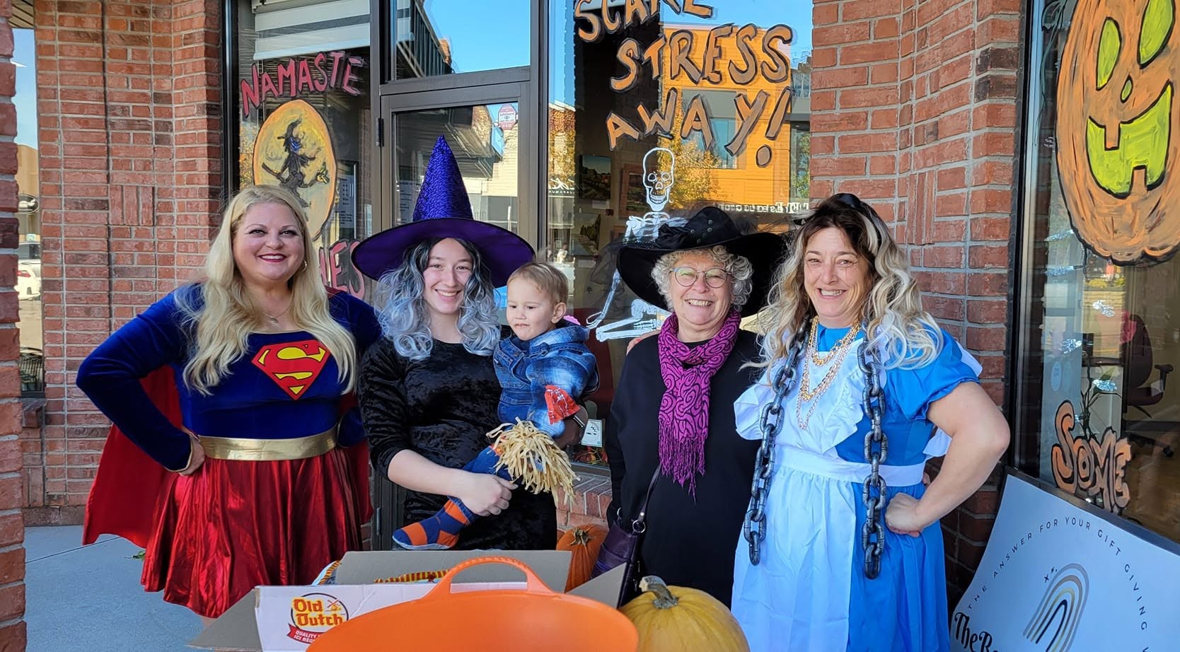 Deanna Bavetta, Skylar Wilds, and Melissa Wrobel ready to welcome families for the Trick or Treat Kingsville event at Wrobel Massage Therapy.