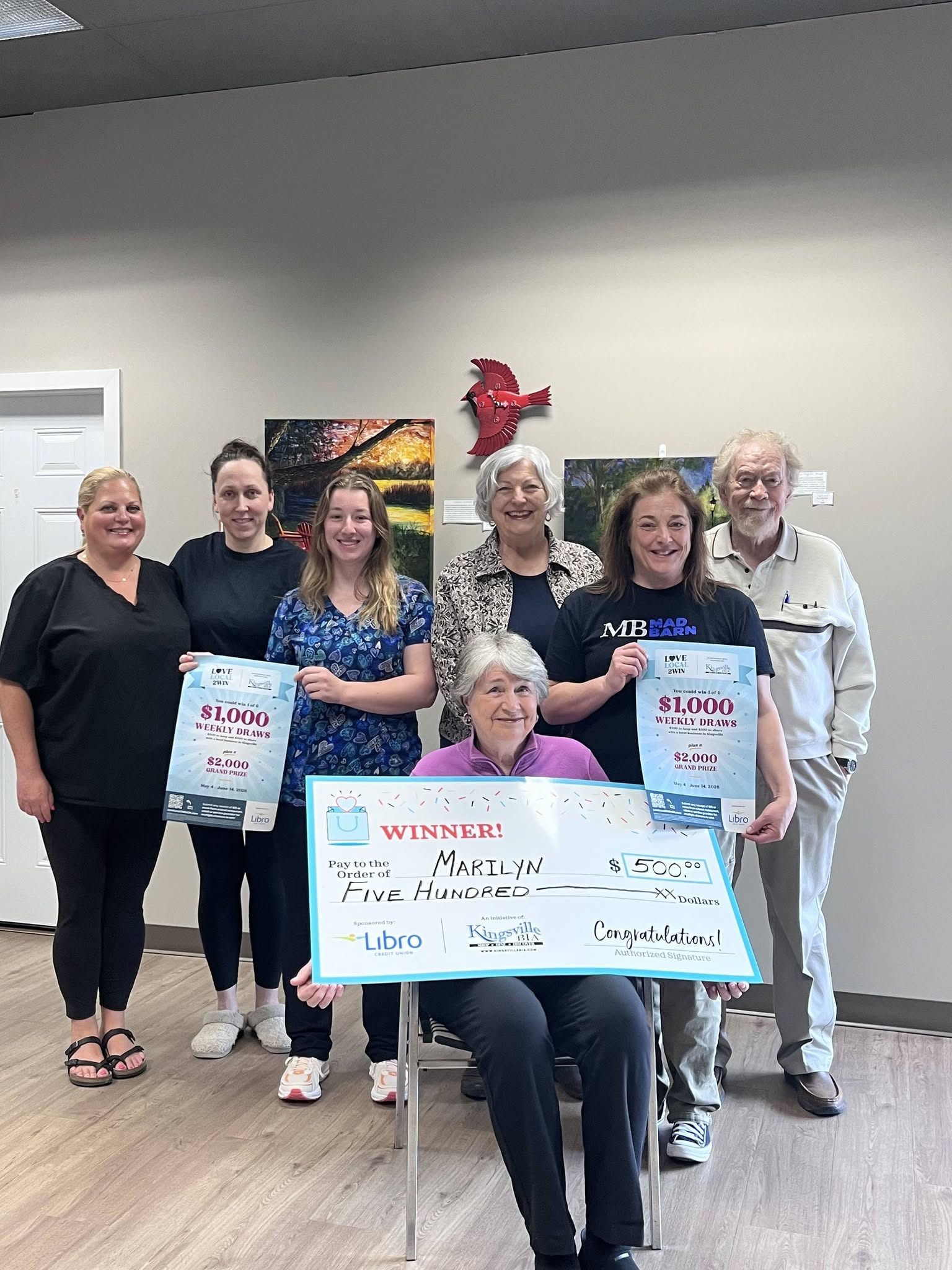 The Wrobel Massage Therapy team alongside first-week winners Marilyn B and her husband, celebrating their win in the 2026 Love Local to Win community promotion.