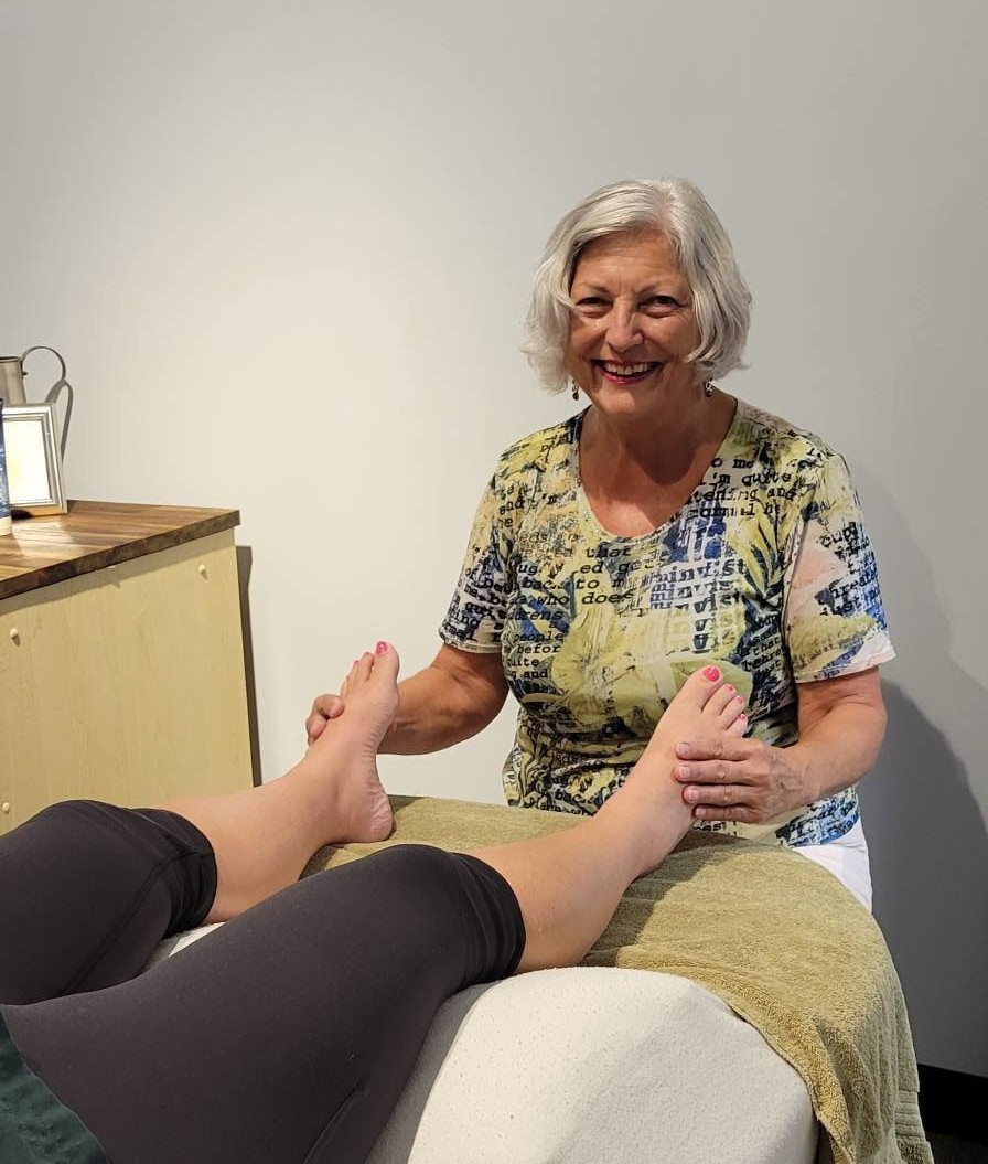 Linda Skowby performing a reflexology treatment at Wrobel Massage Therapy in Kingsville, Ontario.